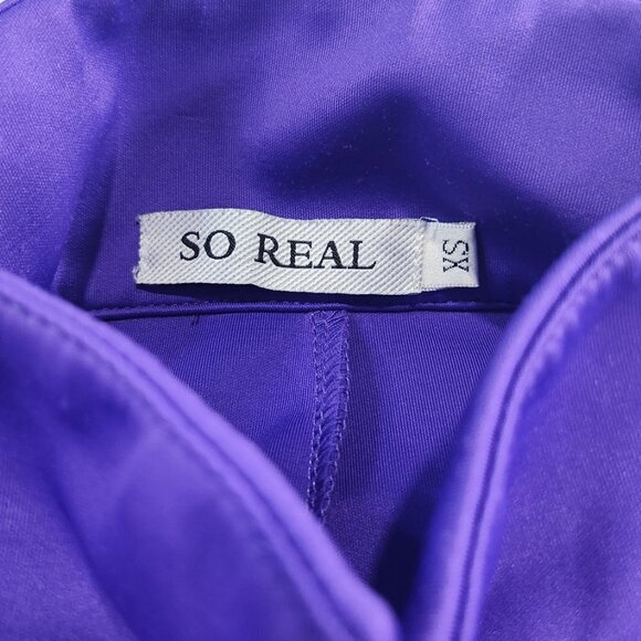 So Real Purple Jumpsuit with Reflective Striping XS
Lot N - Picture 4 of 9